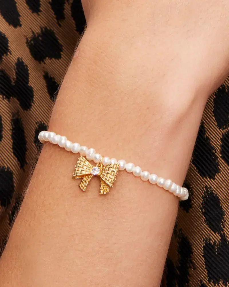 Kate Spade Wrapped In A Bow Pearl Charm Bracelet. 2