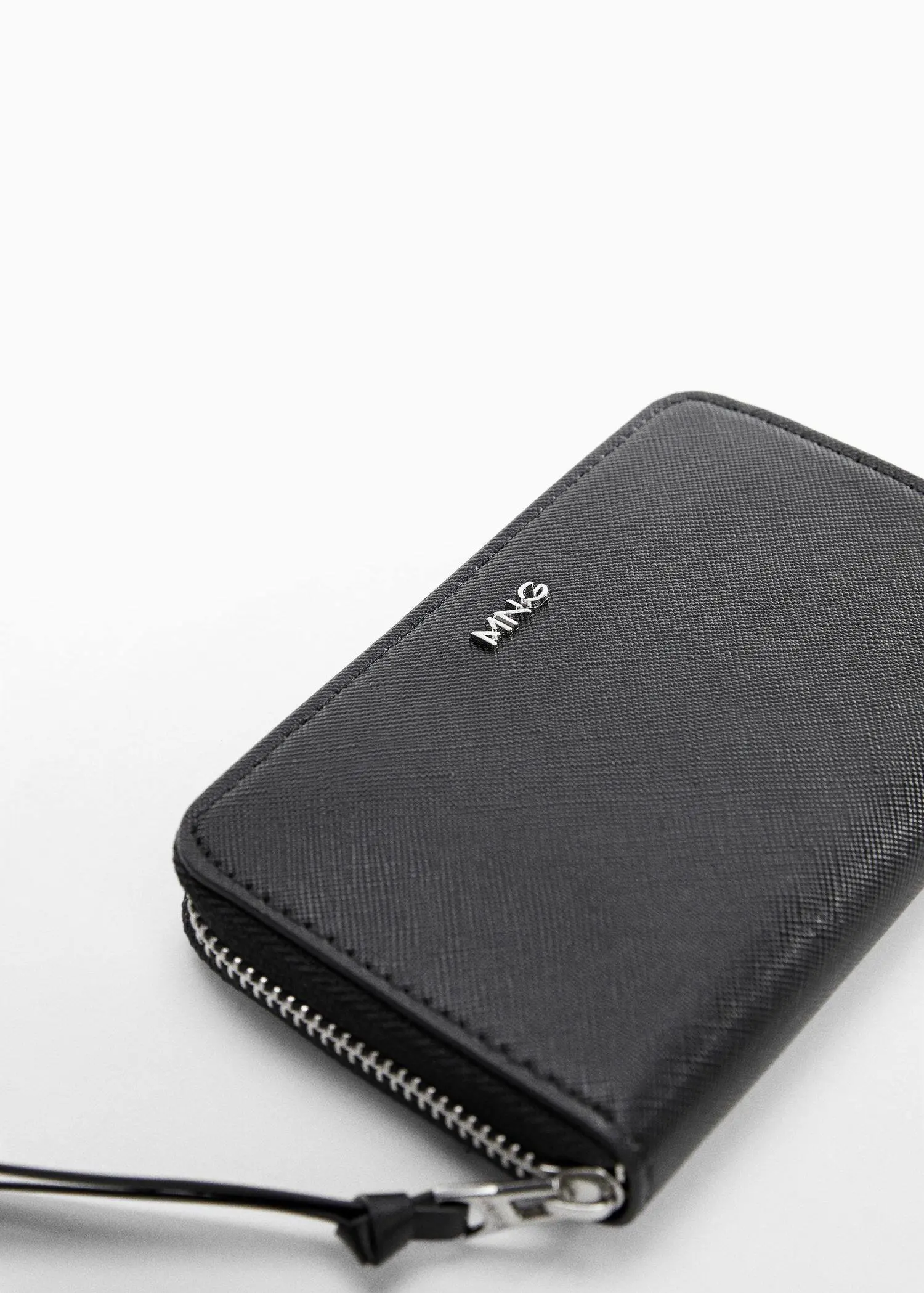 Mango Saffiano-effect wallet. a close-up of a black wallet on a white surface. 