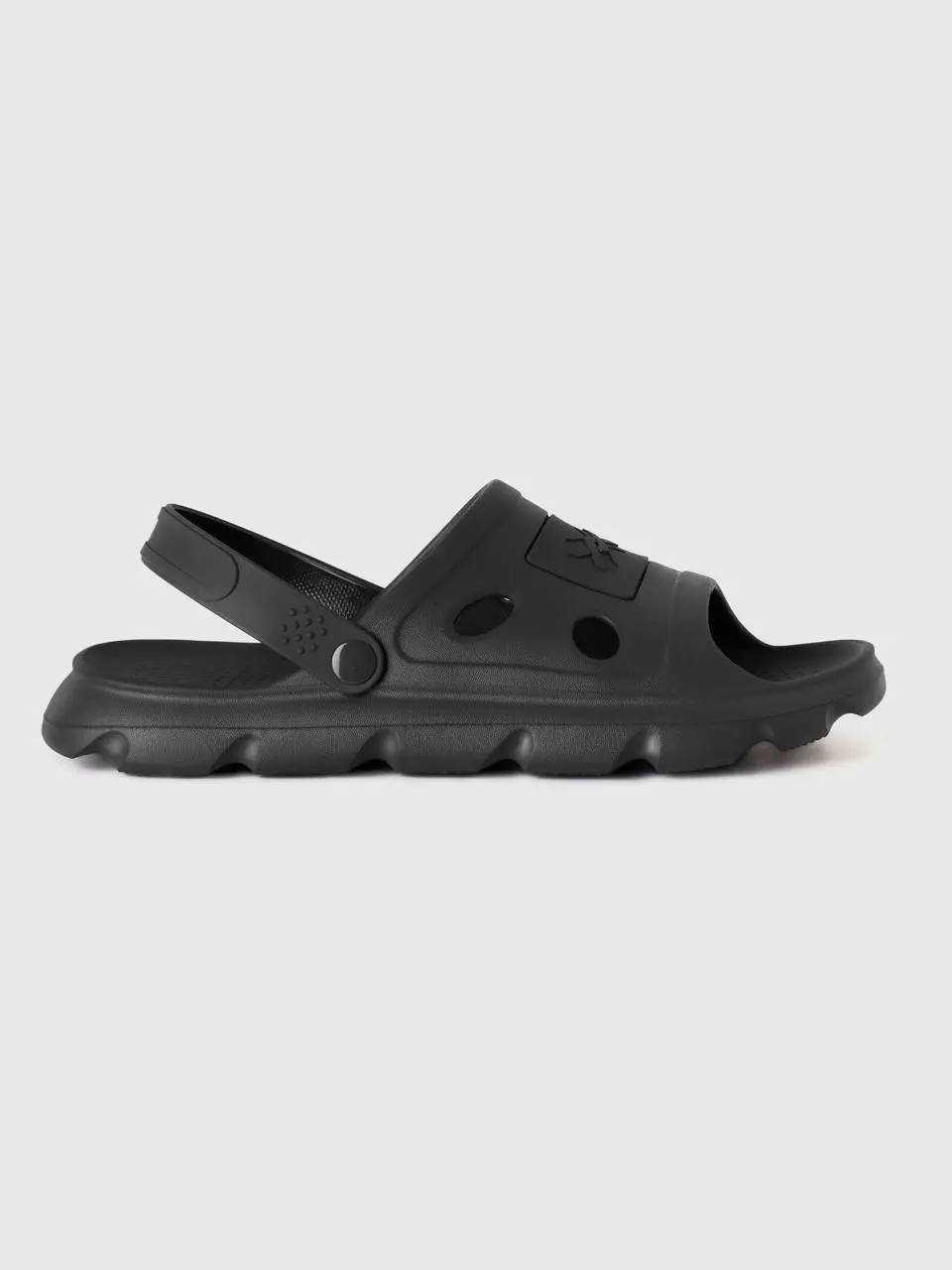 Benetton black sandals in lightweight rubber. 1