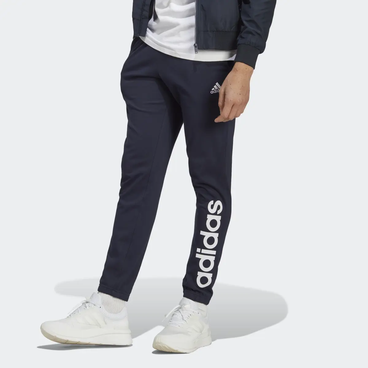 Adidas Essentials Single Jersey Tapered Elasticized Cuff Logo Joggers. 1