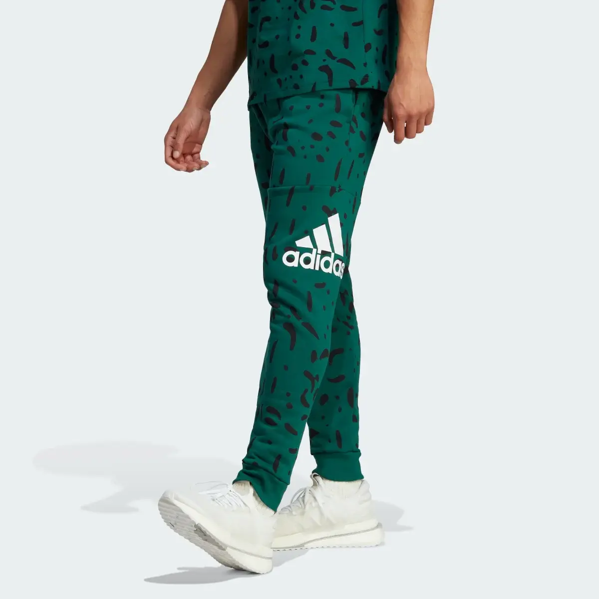 Adidas Pants Essentials Logo Estampado Puño Ajustado. 1