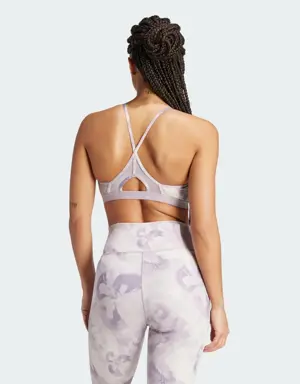 Adidas Brassière de training imprimé floral tie-dye Aeroreact Essentials Maintien léger. 3 Adidas Brassière de training imprimé floral tie-dye Aeroreact Essentials Maintien léger. 3