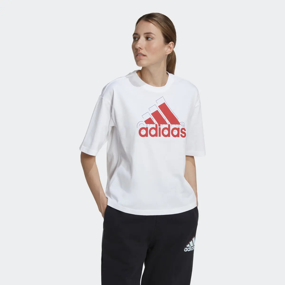 Adidas Essentials Multi-Colored Logo Loose Fit Cropped Tee. 2