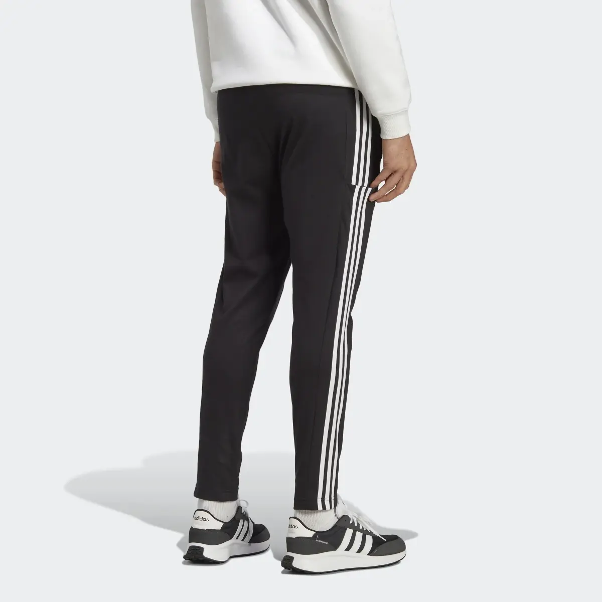 Adidas Essentials Single Jersey Tapered Open Hem 3-Stripes Pants. 2