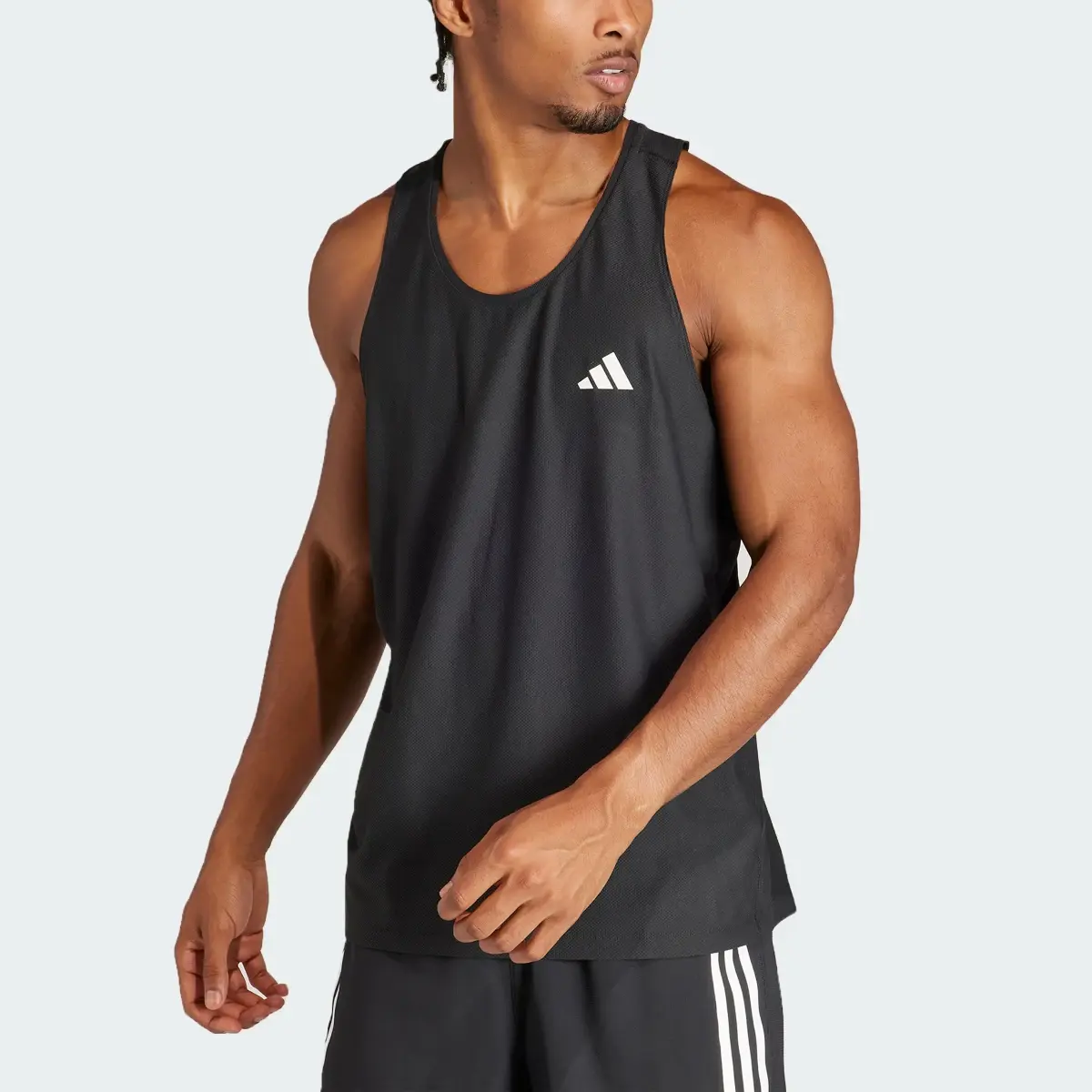 Adidas Own the Run Tanktop. 1