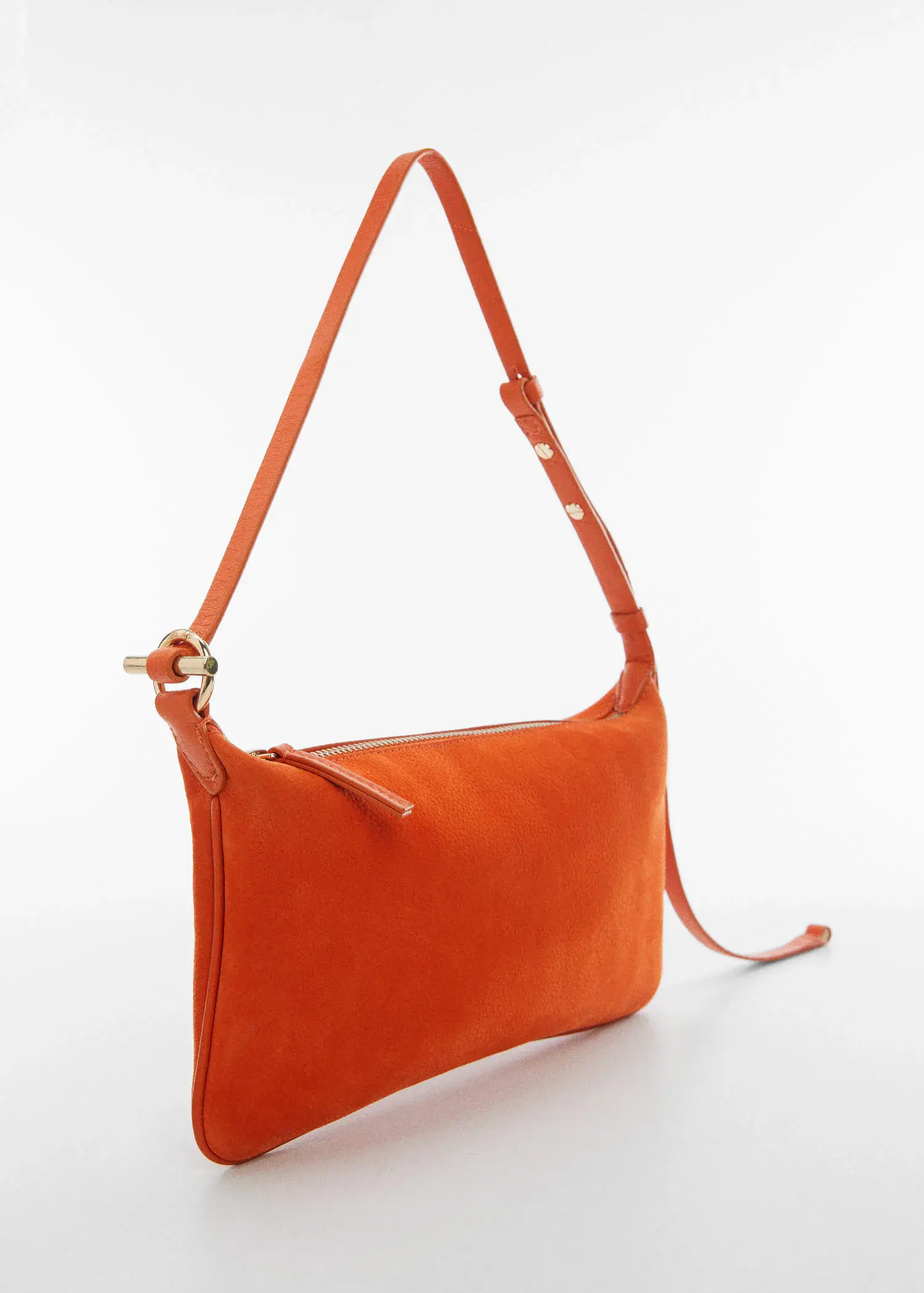 Mango Leather bag with metallic detail. an orange purse is shown on a white surface. 
