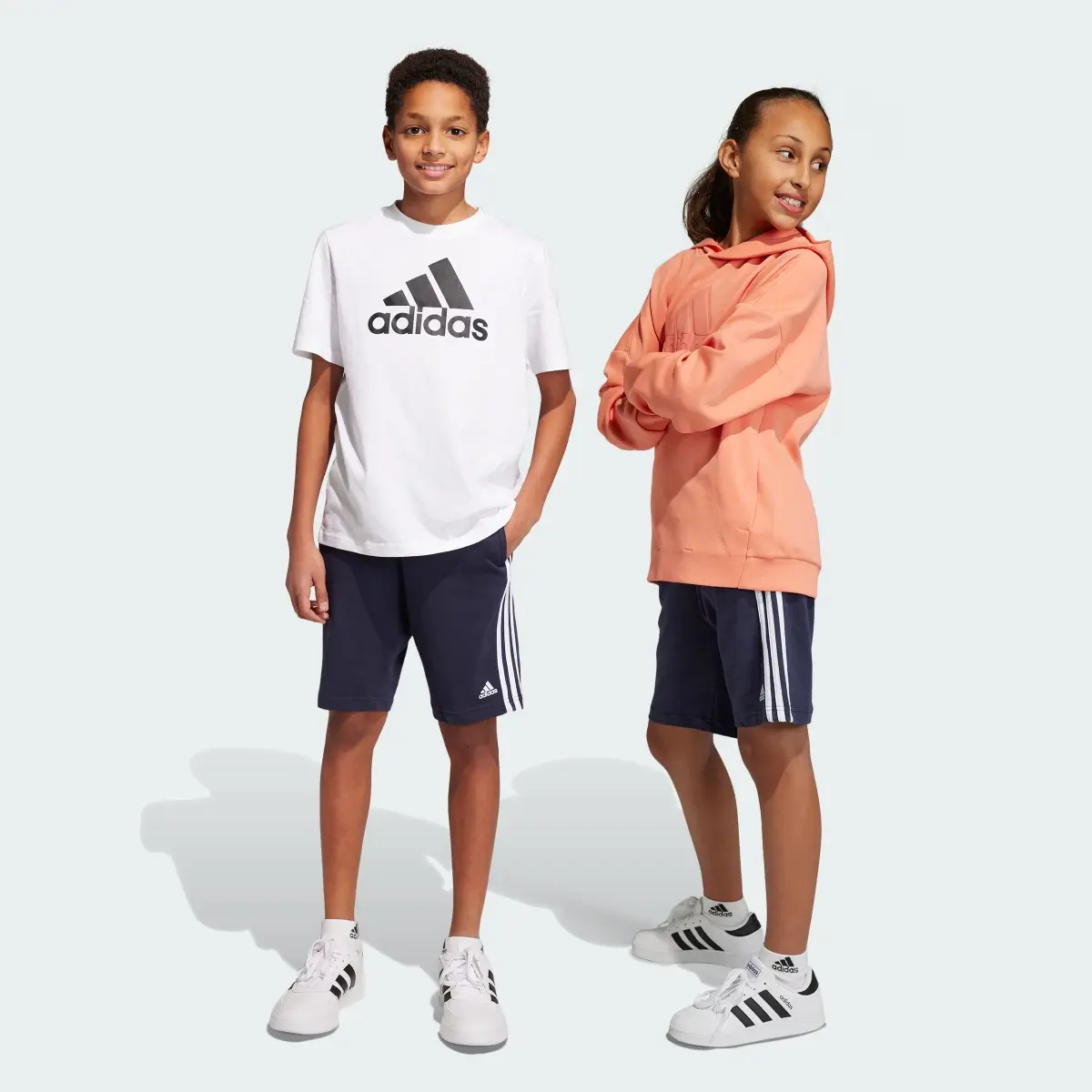 Adidas Essentials 3-Stripes Knit Shorts. 1