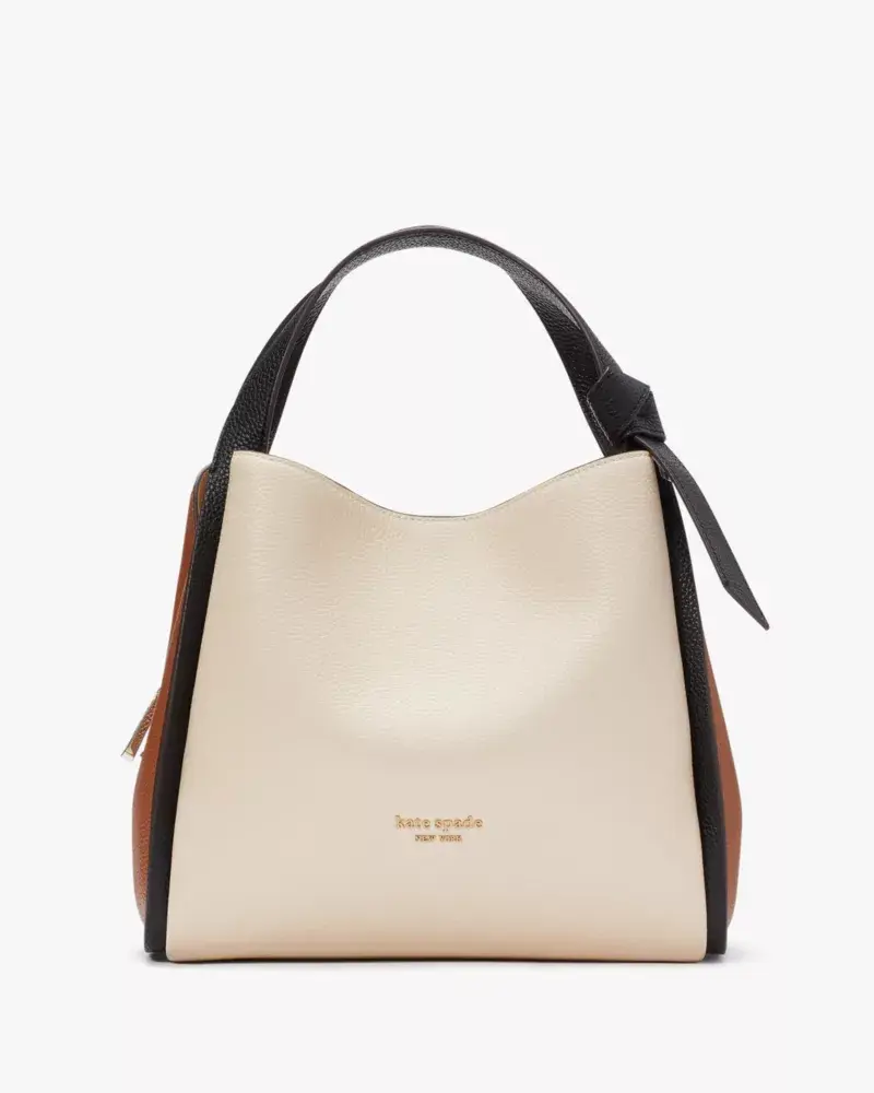 Kate Spade Knott Colorblocked Medium Crossbody Tote. 1