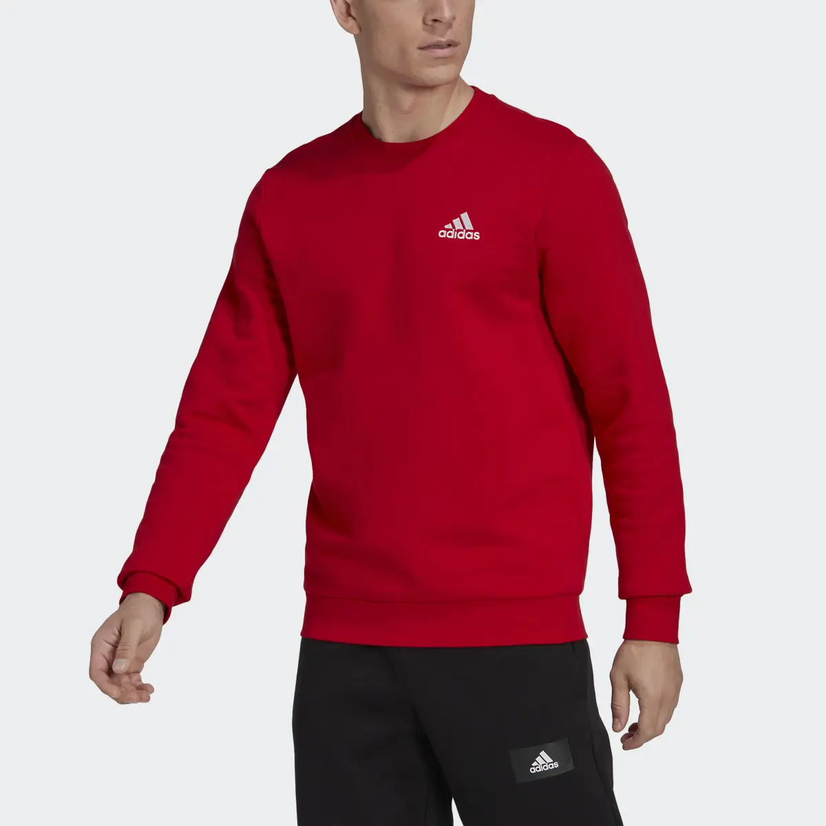 Adidas Essentials Fleece Sweatshirt. 1