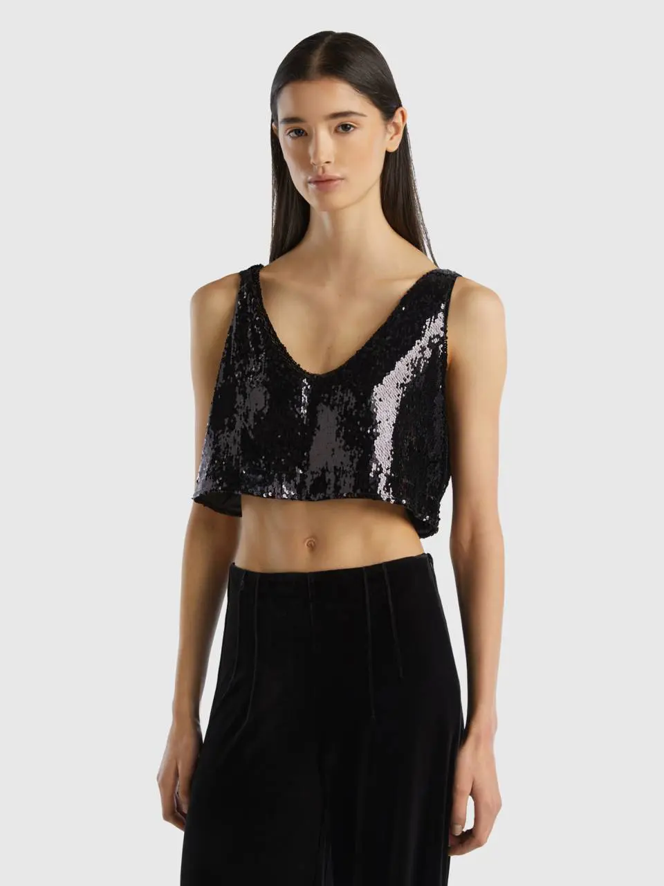 Benetton top with sequins. 1