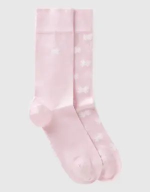 two pairs of light pink socks