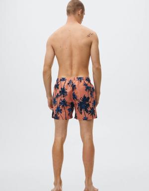 Hawaiian print swimming trunks