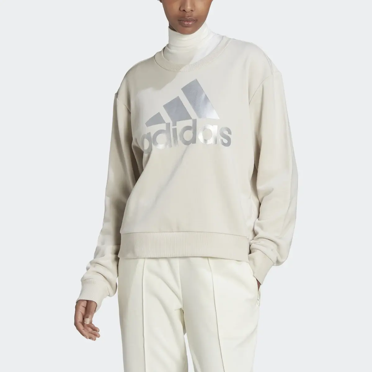 Adidas Essentials Logo Loose Sweatshirt. 1