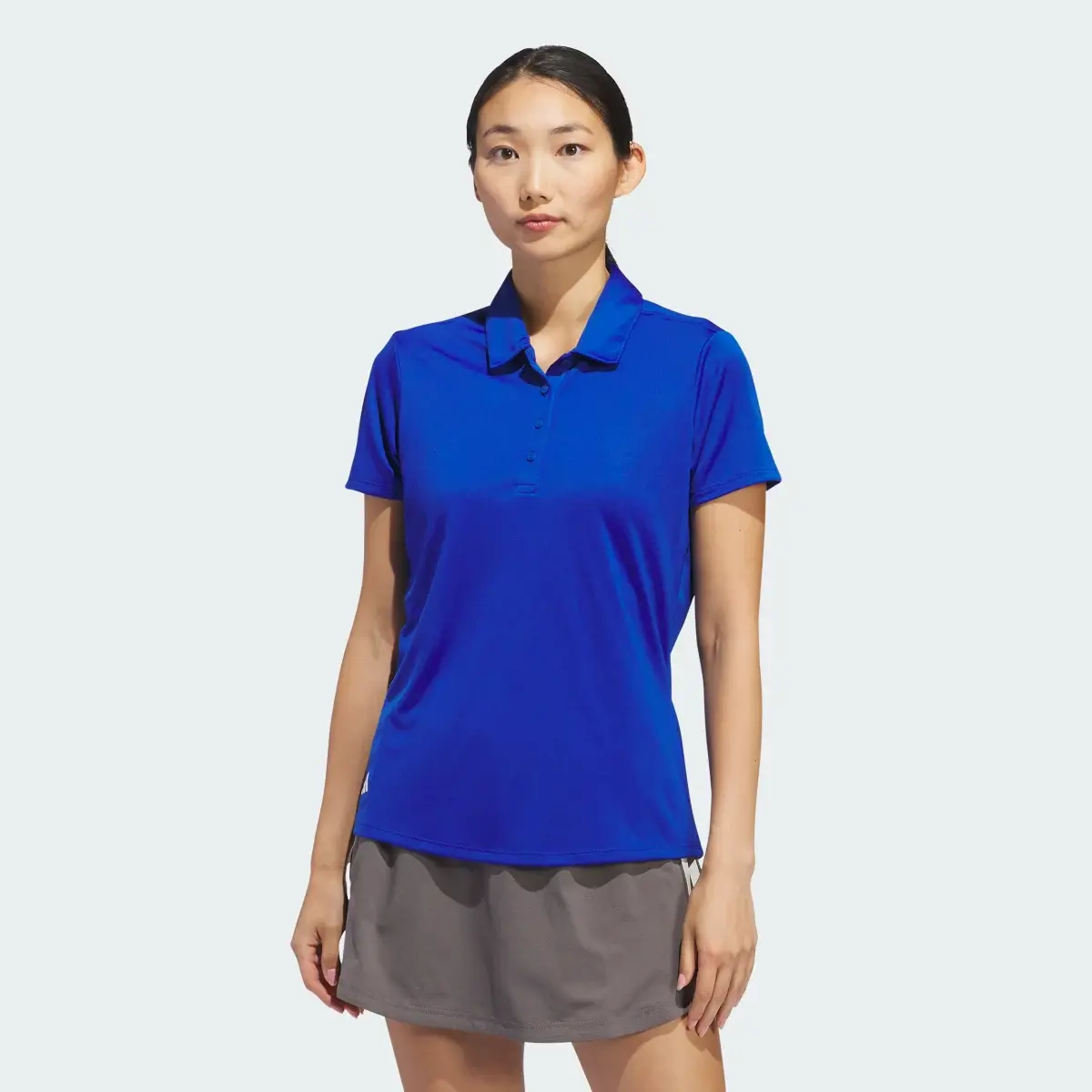 Adidas Women's Solid Performance Short Sleeve Polo Shirt. 2