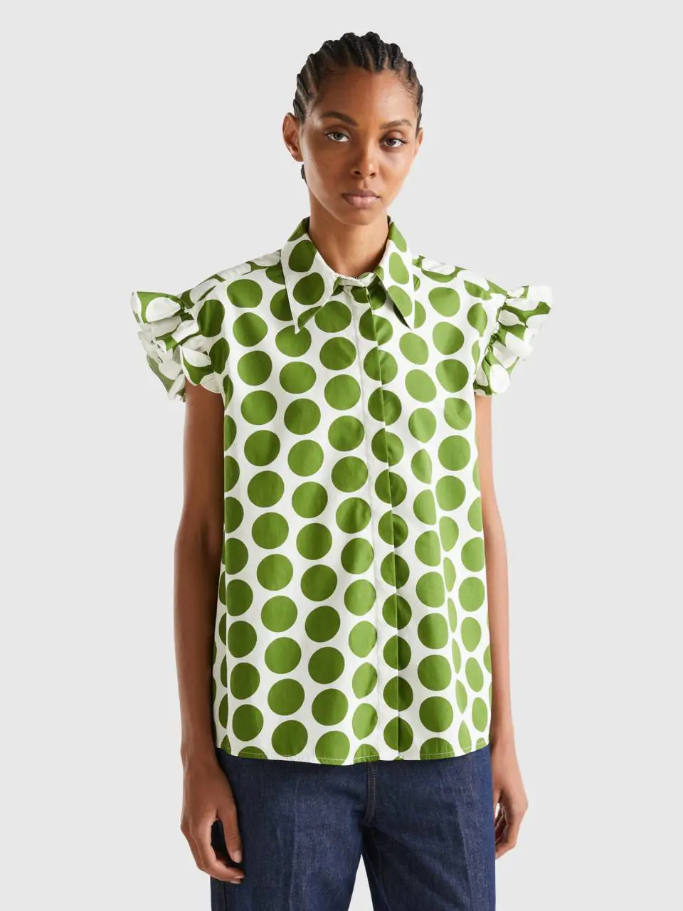 Benetton sleeveless polka dot shirt. 1