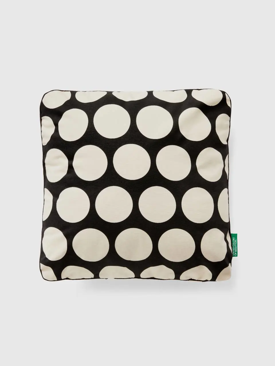 Benetton square pillow with white polka dots. 1