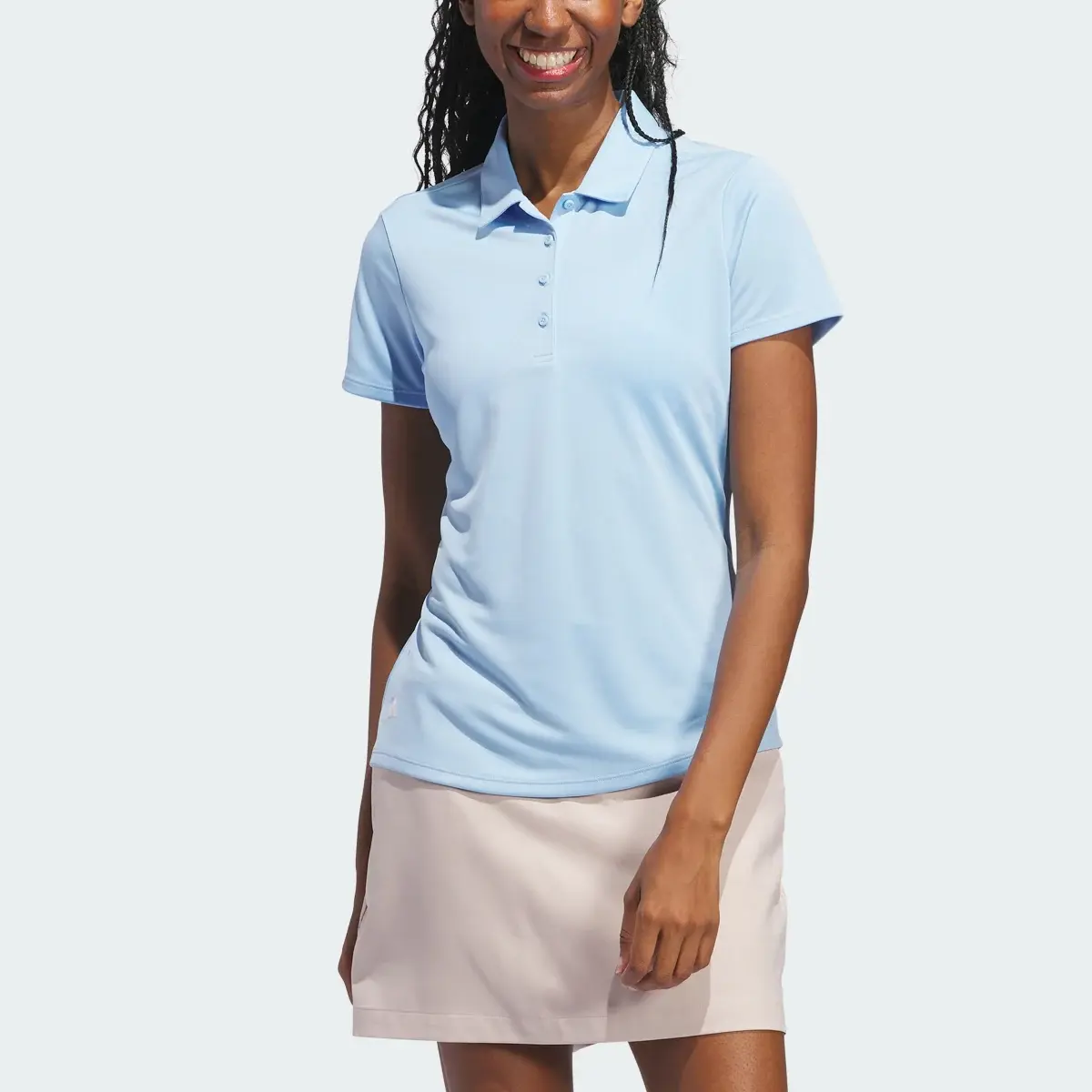 Adidas Women's Solid Performance Short Sleeve Polo Shirt. 1