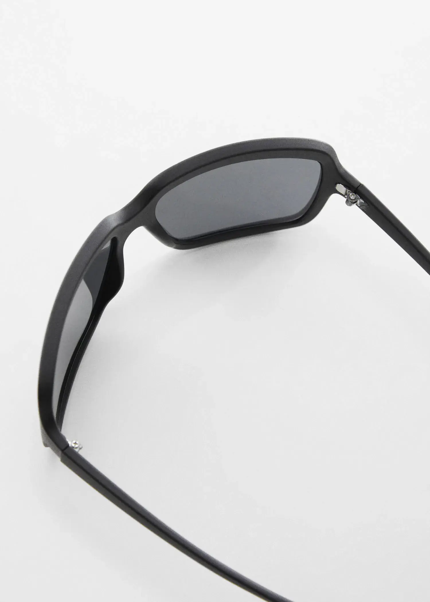 Mango Squared frame sunglasses. a pair of sunglasses on top of a white surface. 