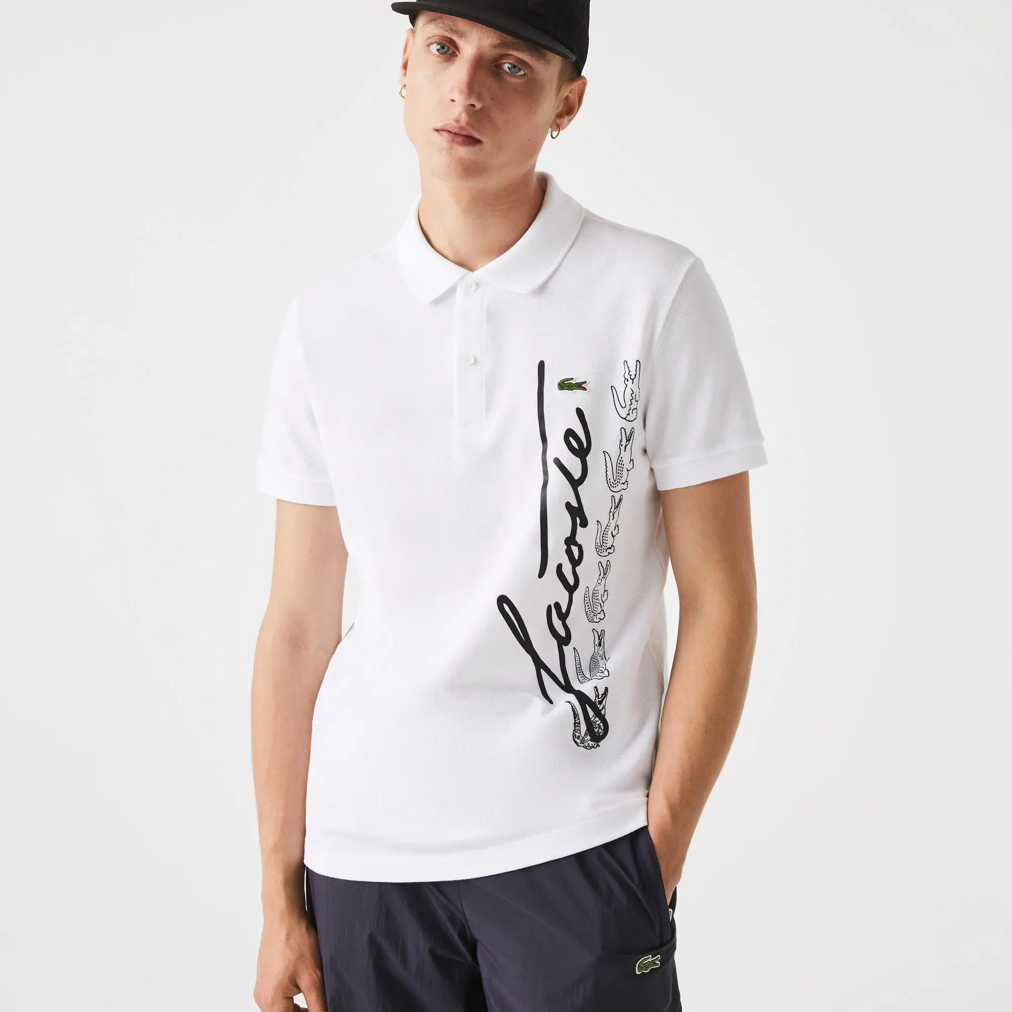 Lacoste Men's Regular Fit Signature Cotton Piqué Polo. 1