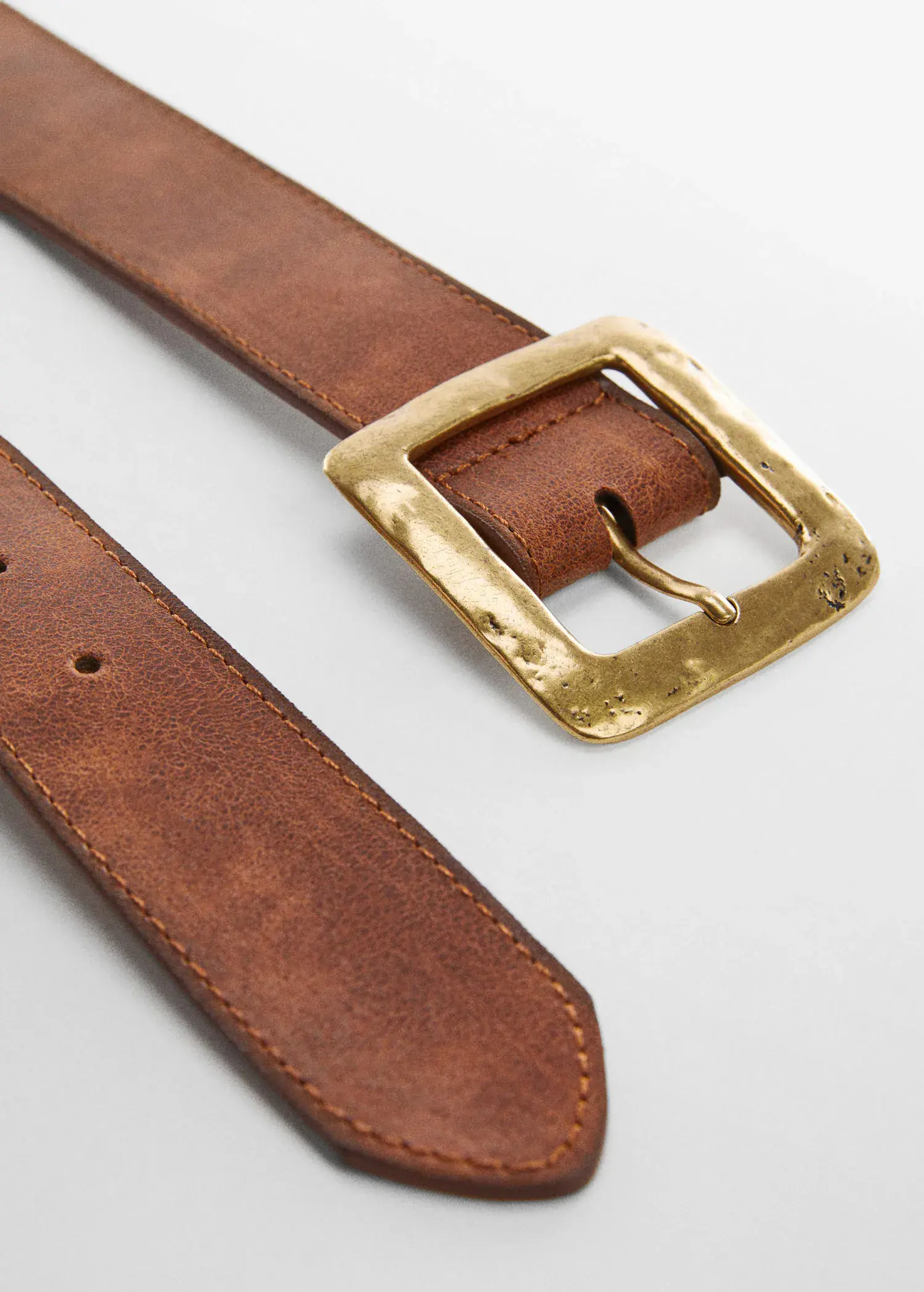 Mango Textured square buckle belt. a close-up of a brown leather belt with a brass buckle. 