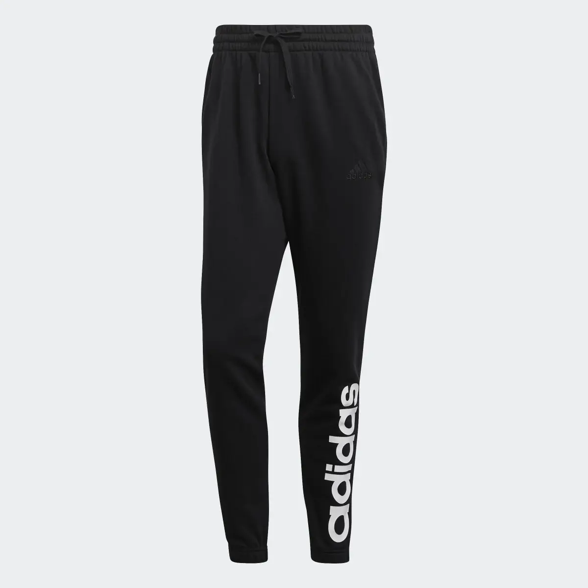 Adidas Essentials French Terry Tapered Elastic Cuff Logo Joggers. 1