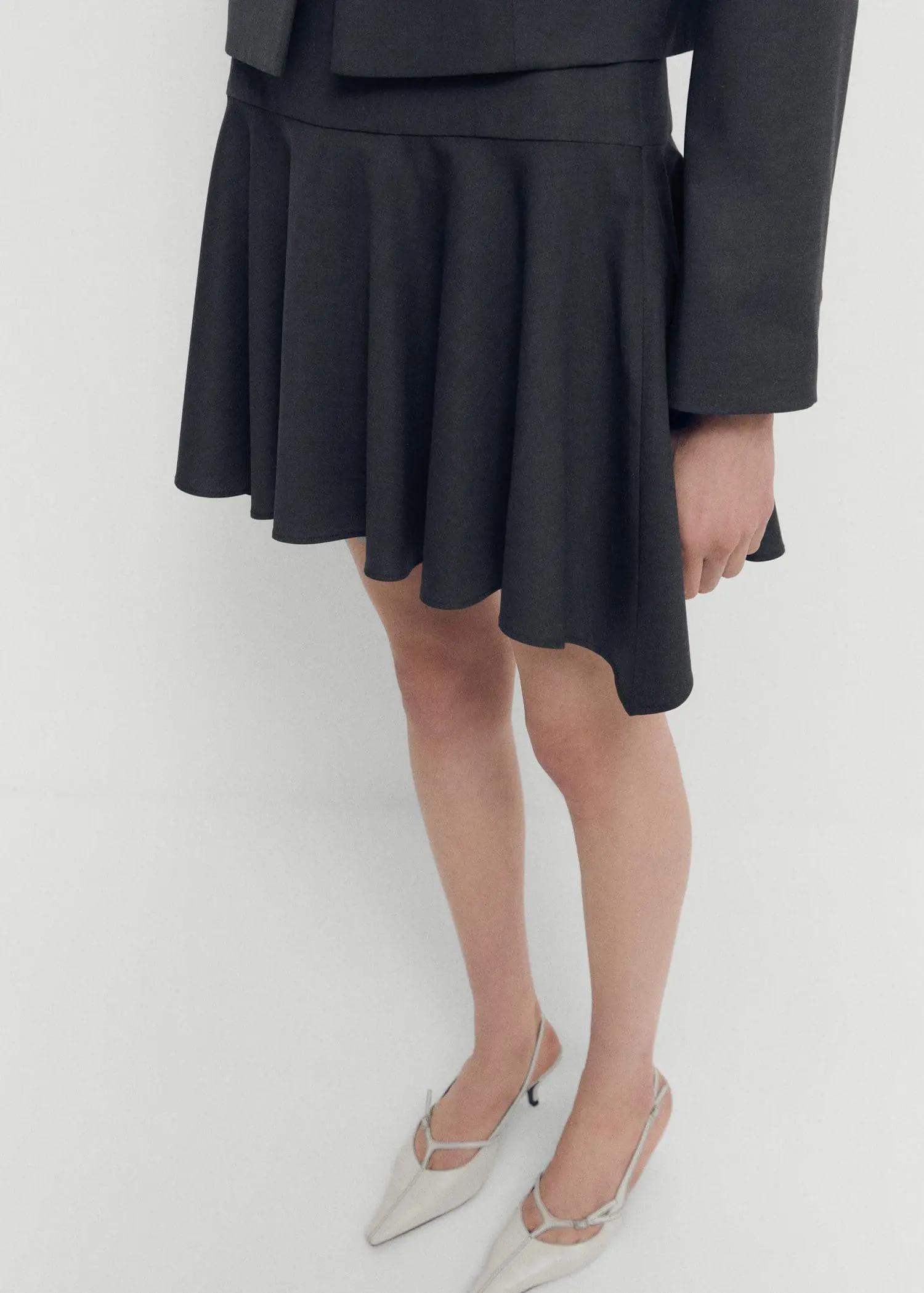 Mango Wool mini-skirt with asymmetrical hem. 2
