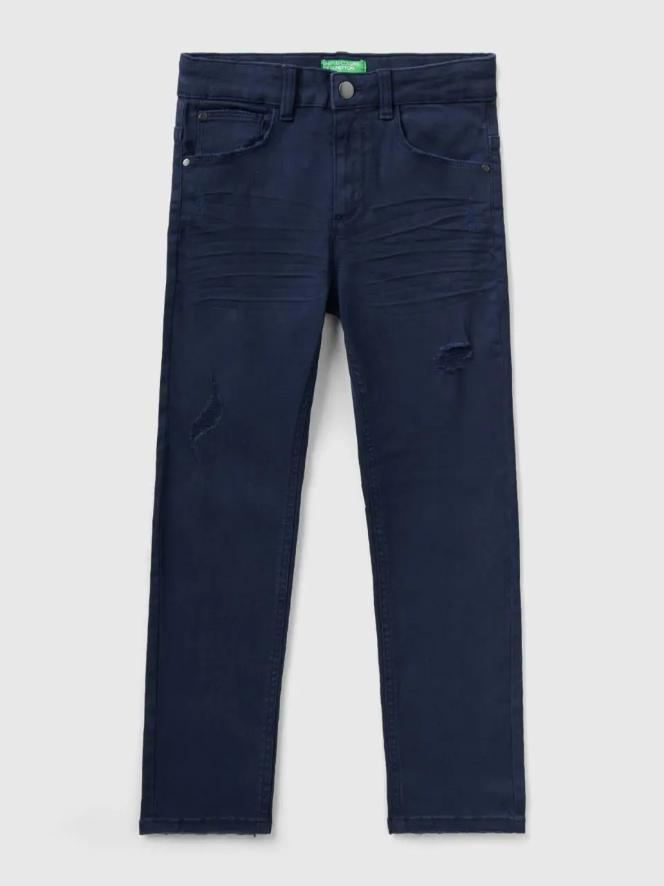Benetton stretch jeans with tears. 1