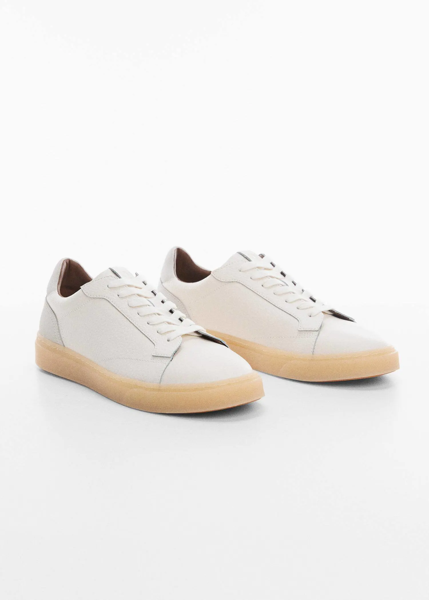 Mango Nappa leather trainers. a pair of white sneakers with a wooden sole. 