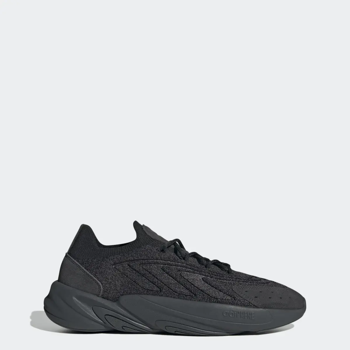 Adidas OZELIA Knit Shoes. 1