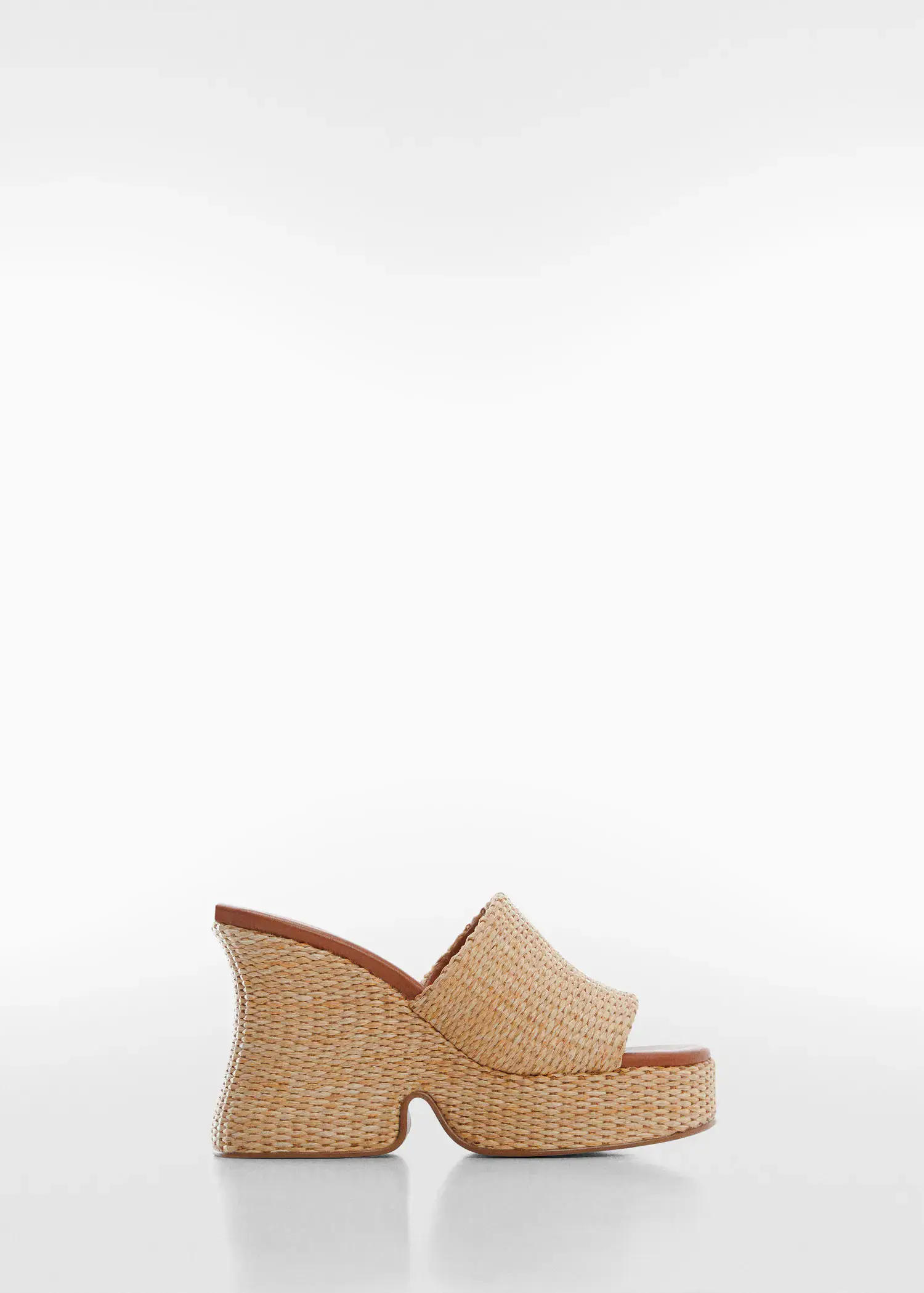 Mango Natural fiber wedge sandals. a pair of shoes that are on the ground. 