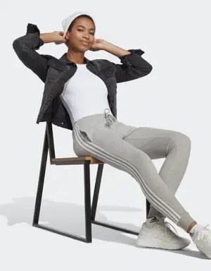 Adidas Pantalon fuselé en molleton à 3 bandes Essentials. 3 Adidas Pantalon fuselé en molleton à 3 bandes Essentials. 3