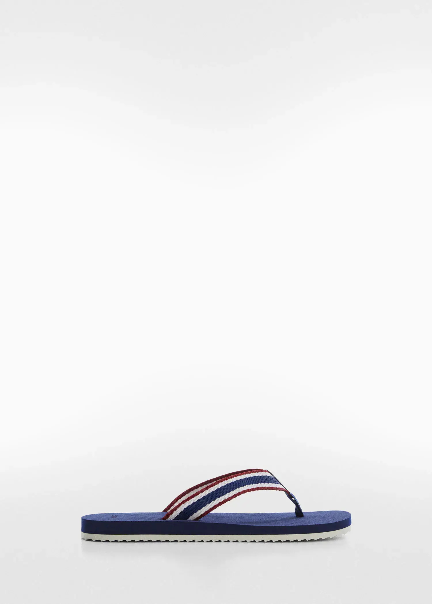 Mango Flip-flops with contrasting colour straps. a pair of blue flip flops on top of a white surface. 