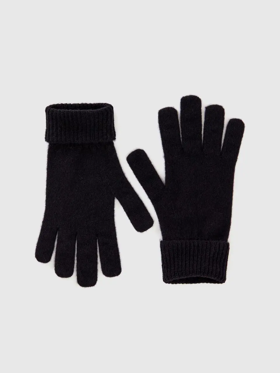 Benetton black gloves in pure merino wool. 1