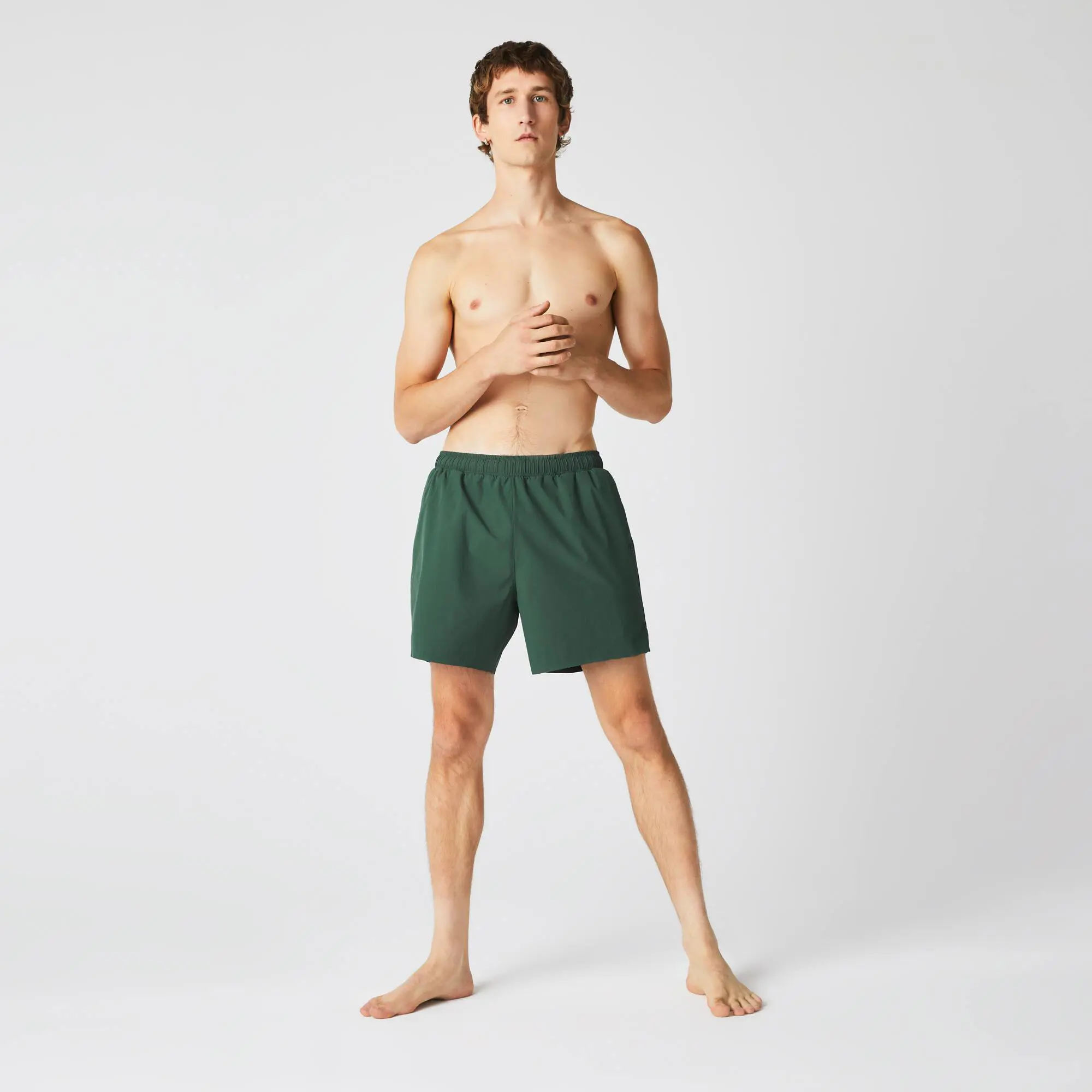 Lacoste Short de bain léger court uni avec boxer intégré. 1