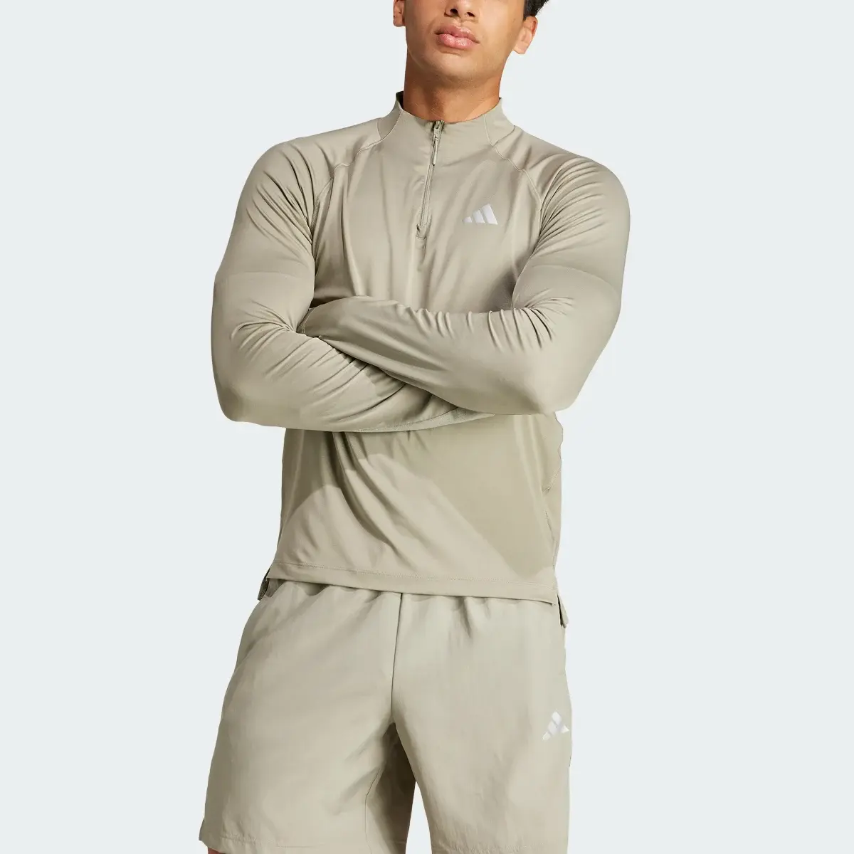 Adidas Gym+ Training 1/4-Zip Long Sleeve Tee. 1