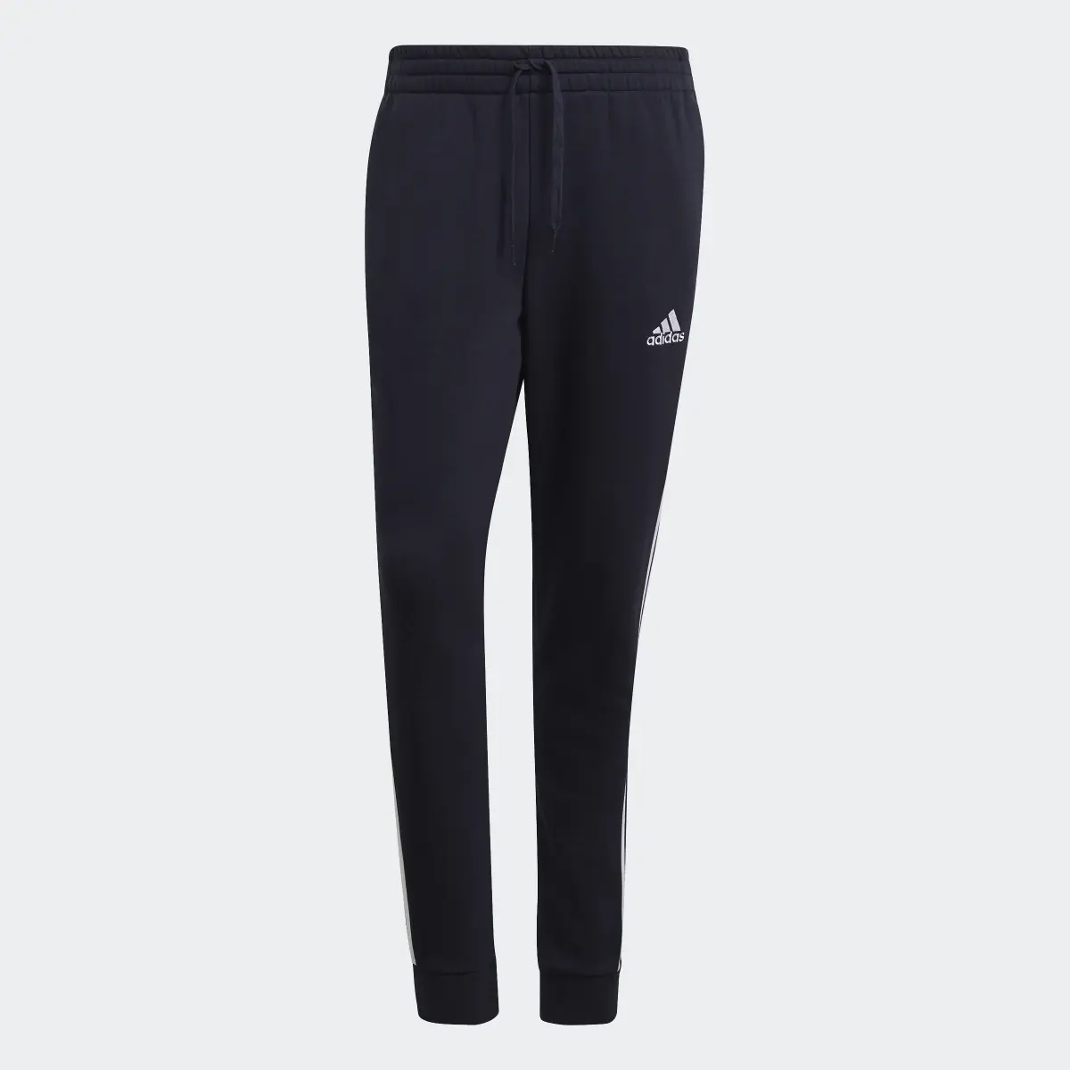 Adidas Pantalon Essentials Fleece Tapered Cuff 3-Stripes. 1