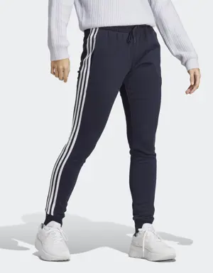 Adidas Pantalón Essentials French Terry Cuffed 3 bandas. 3 Adidas Pantalón Essentials French Terry Cuffed 3 bandas. 3
