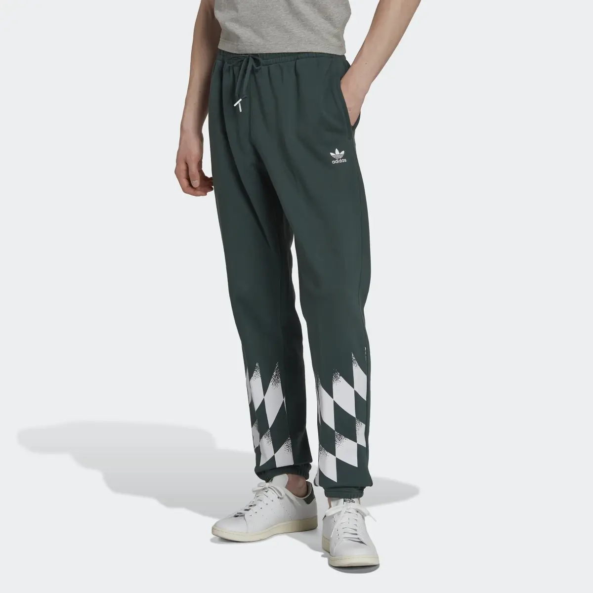 Adidas Rekive Placed Graphic Sweat Pants. 1