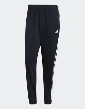 Adidas Pantaloni da allenamento Primegreen Essentials Warm-Up Tapered 3-Stripes