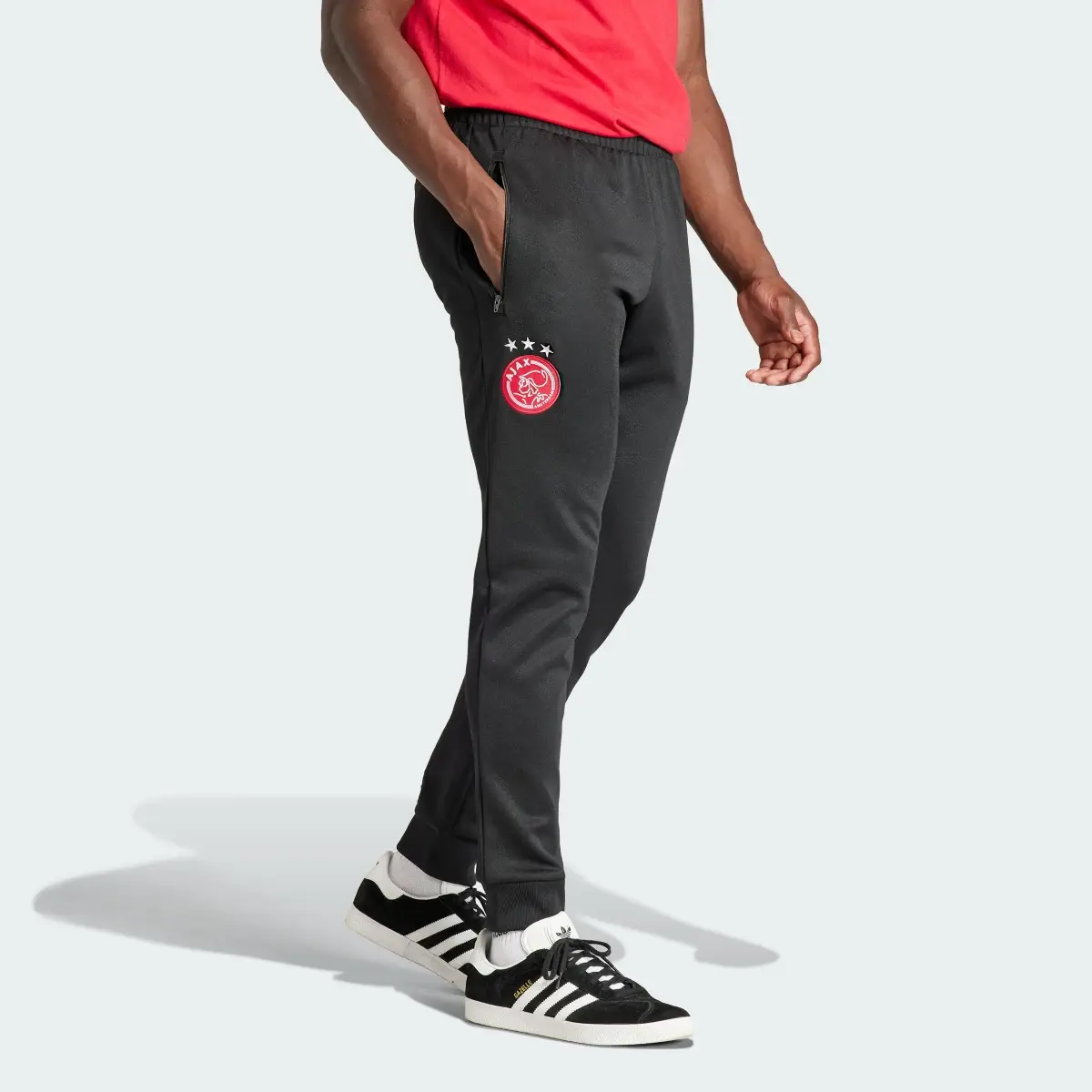 Adidas Pantaloni da allenamento Essentials Trefoil Ajax Amsterdam. 1