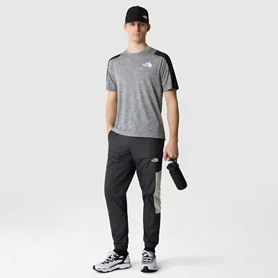 The North Face Men&#39;s Mountain Athletics Wind Track Trousers. 1