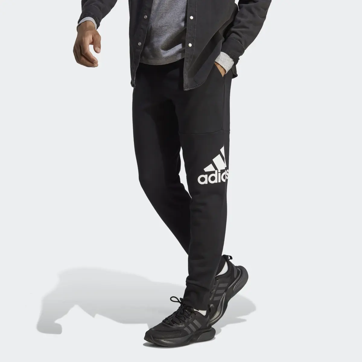 Adidas Essentials French Terry Tapered Cuff Logo Joggers. 1