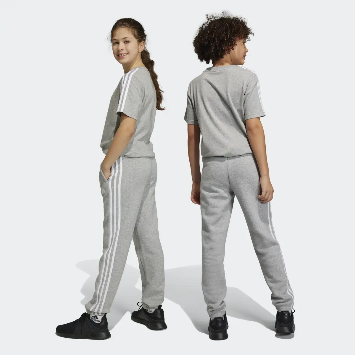 Adidas Essentials 3-Stripes Fleece Pants. 2