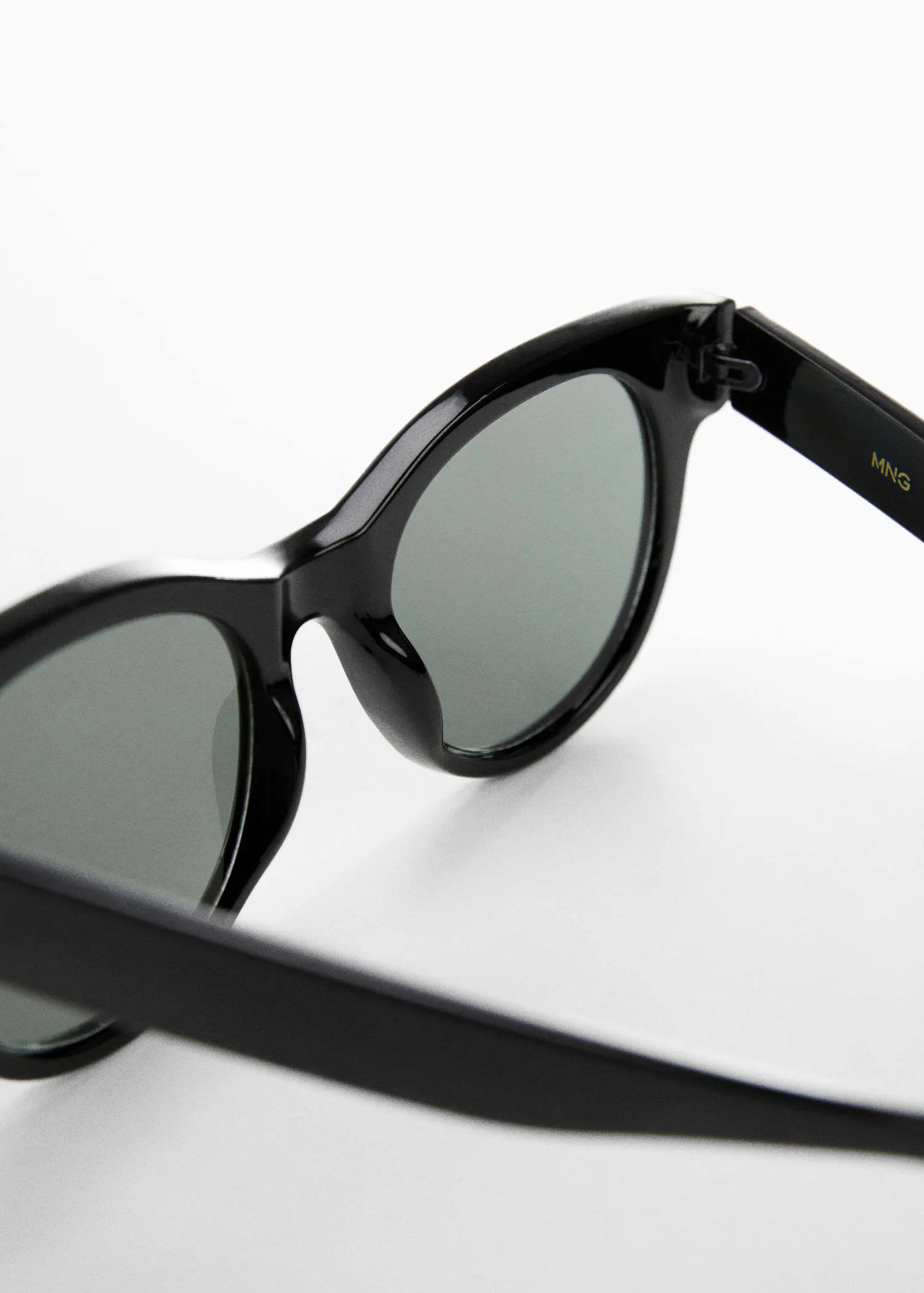Mango Tortoiseshell sunglasses. a close up of a pair of sunglasses 