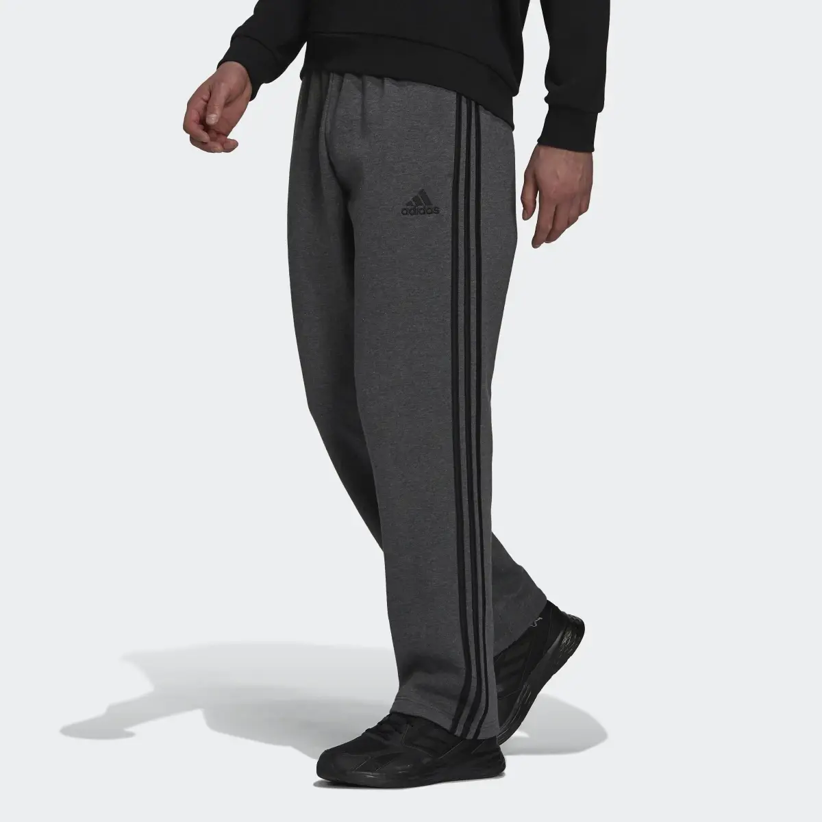 Adidas Essentials Fleece Open Hem 3-Stripes Joggers. 1