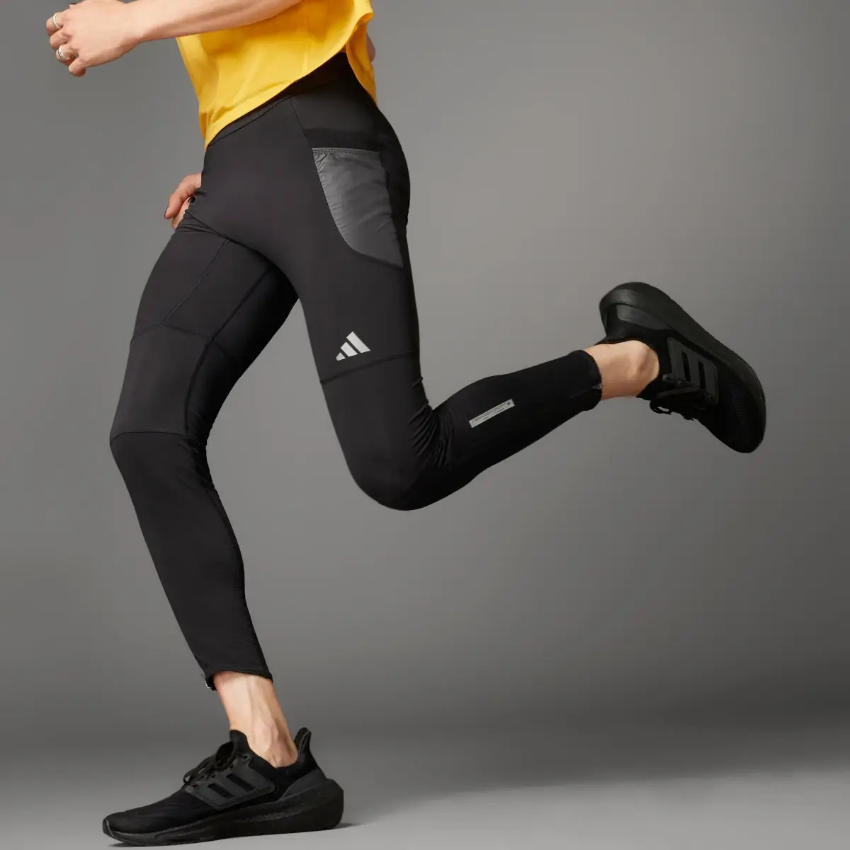 Adidas Ultimate Running Conquer the Elements COLD.RDY Leggings. 1