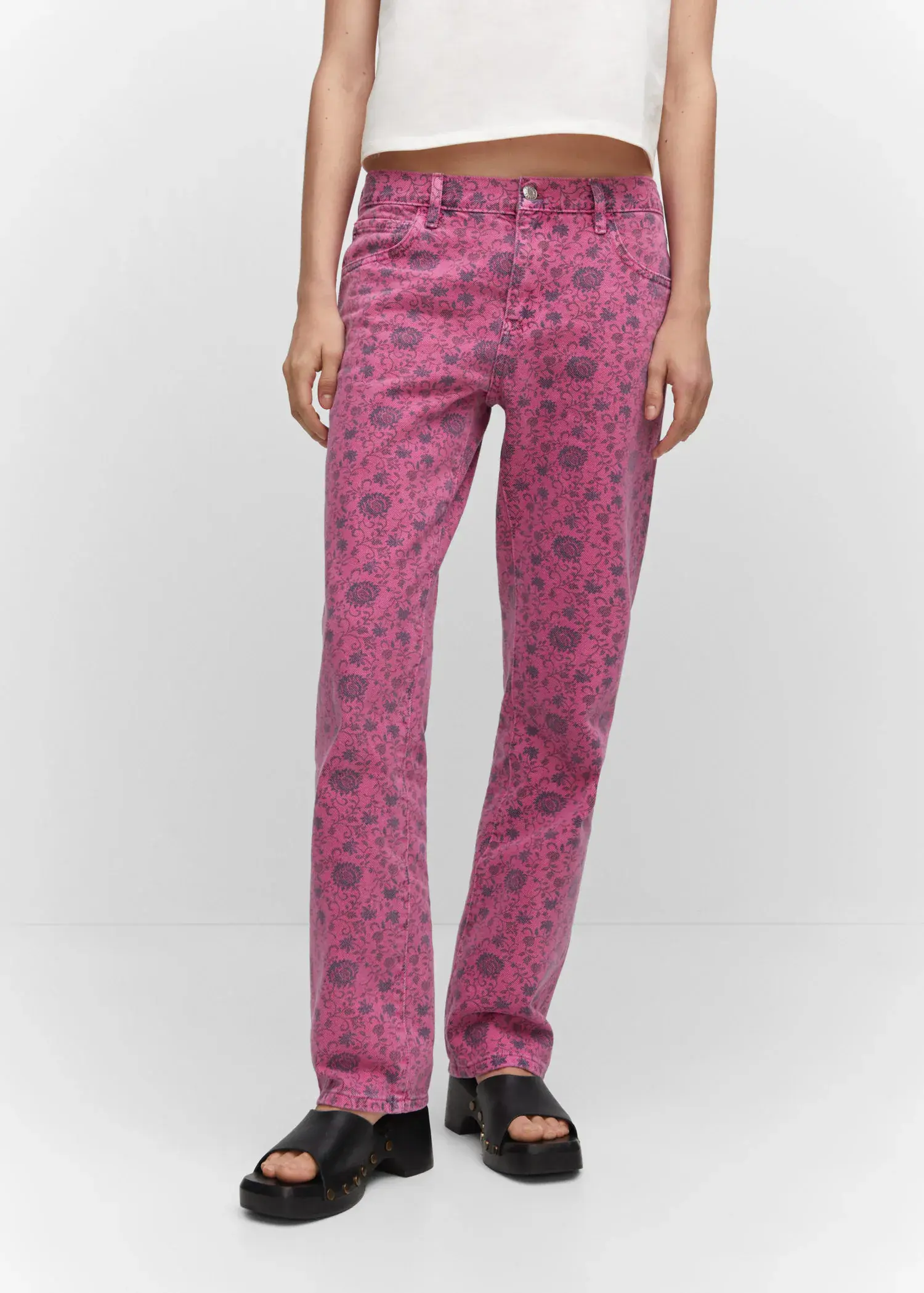 Mango Printed straight jeans. a woman wearing a pair of pink pants. 