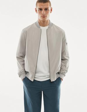 Bomber jacket made of water-repellent technical fabric
