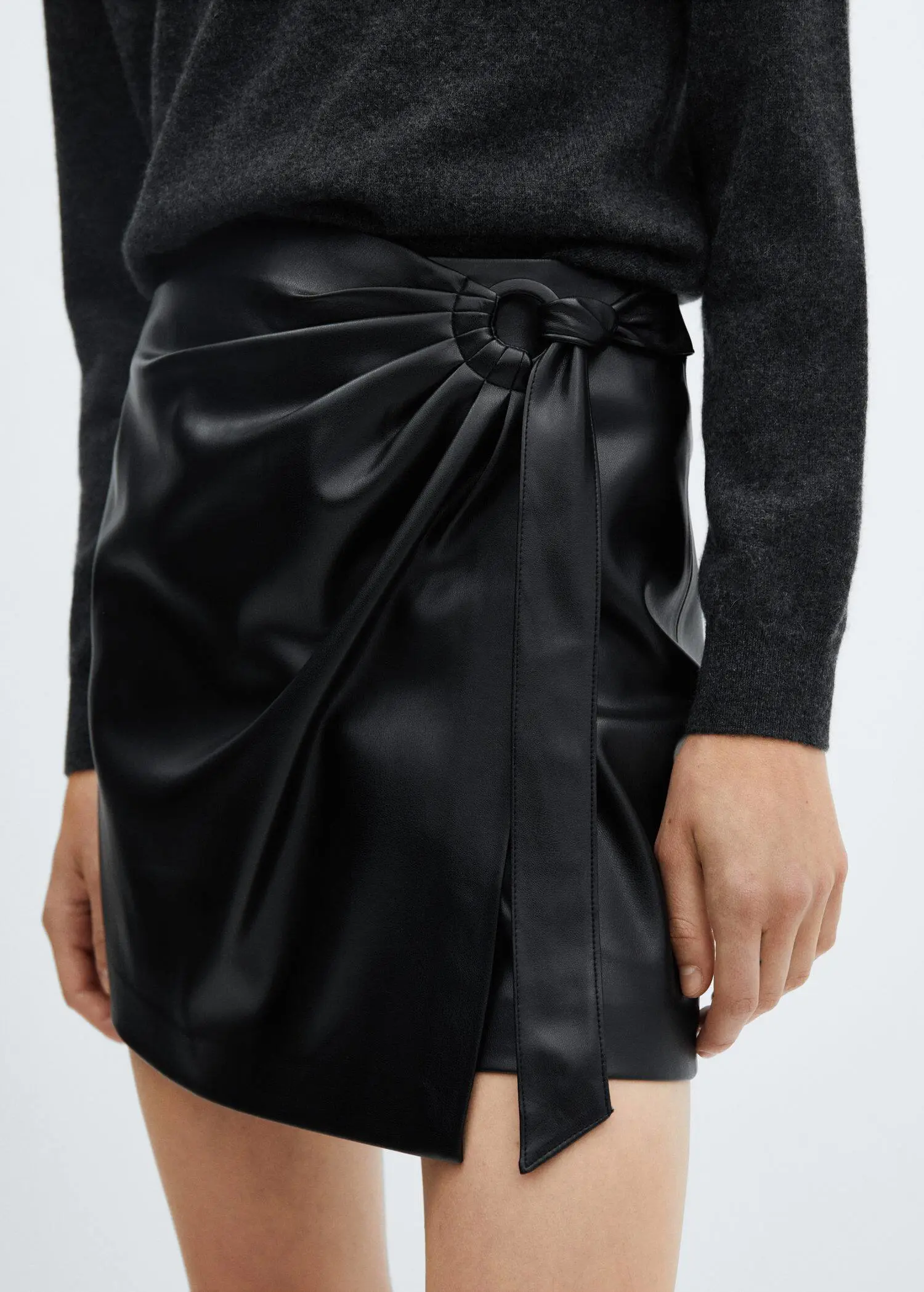 Mango Short leather-effect skirt with buckle. 2