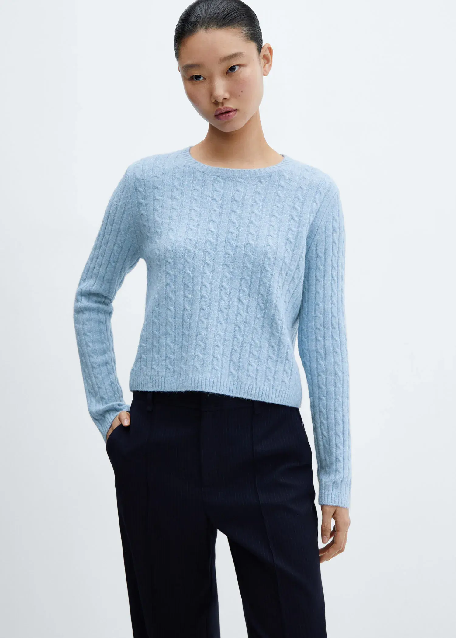 Mango Pullover mit Zopfmuster. 1